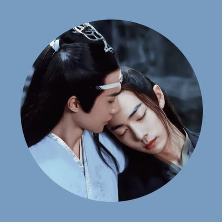 a screencap of wei wuxian with his head on lan wangji’s shoulder from the web series, with a blue border.